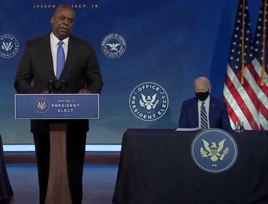 Lloyd Austin speaks in front of then-President-Elect Joe Biden after being nominated for Defense Secretary.